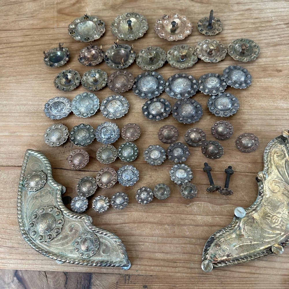 Vintage silver floral design conchos, etc.  for Western show saddle. 52 pieces.